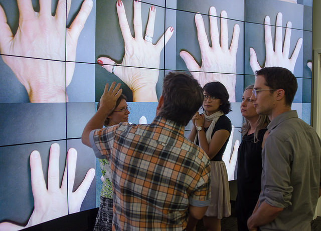 Hands displayed on LCD screen