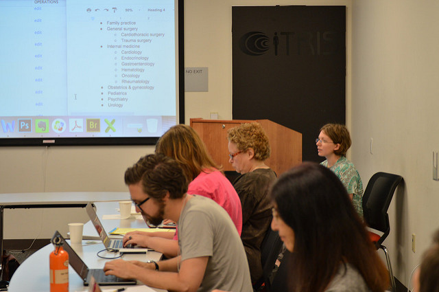 Photo: Quinn Dombrowski teaching "Database Development Using Drupal"