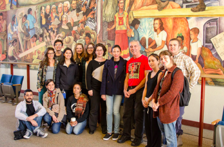 Group photo at Diego Rivera's Pan American Unity at City College San Francisco